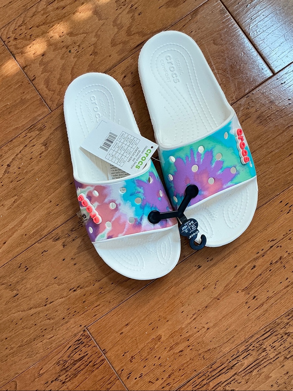 CROCS Kids' Tie-Dye Slide Sandals in White with Multicolor Strap